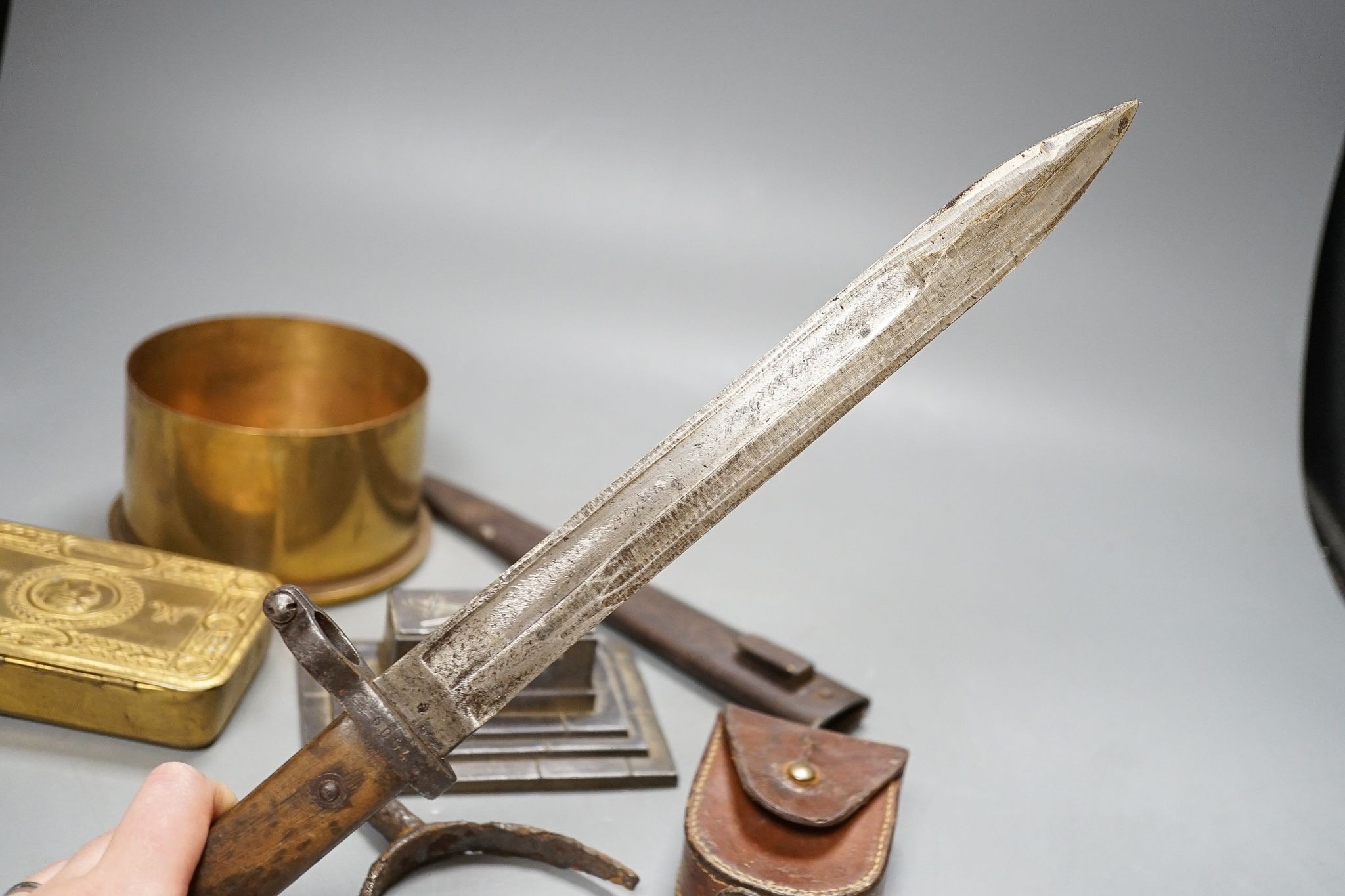 A British WWI Short & Mason compass, two bayonets, cartridge case, Lucas morse code, etc.